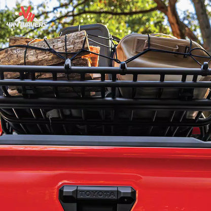 Large steel cargo basket mounted on overland truck rack