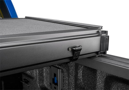 Extang Solid Fold ALX hard folding tonneau cover on a 2020-2026 Jeep Gladiator JT with 5-foot bed, showing panel details