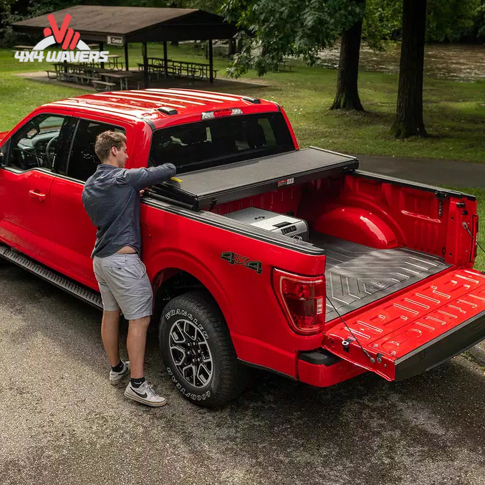 Extang Solid Fold ALX tonneau cover folded open on a 2015-2020 Ford F-150 with 5.5ft bed, showcasing its durable design and bed access.