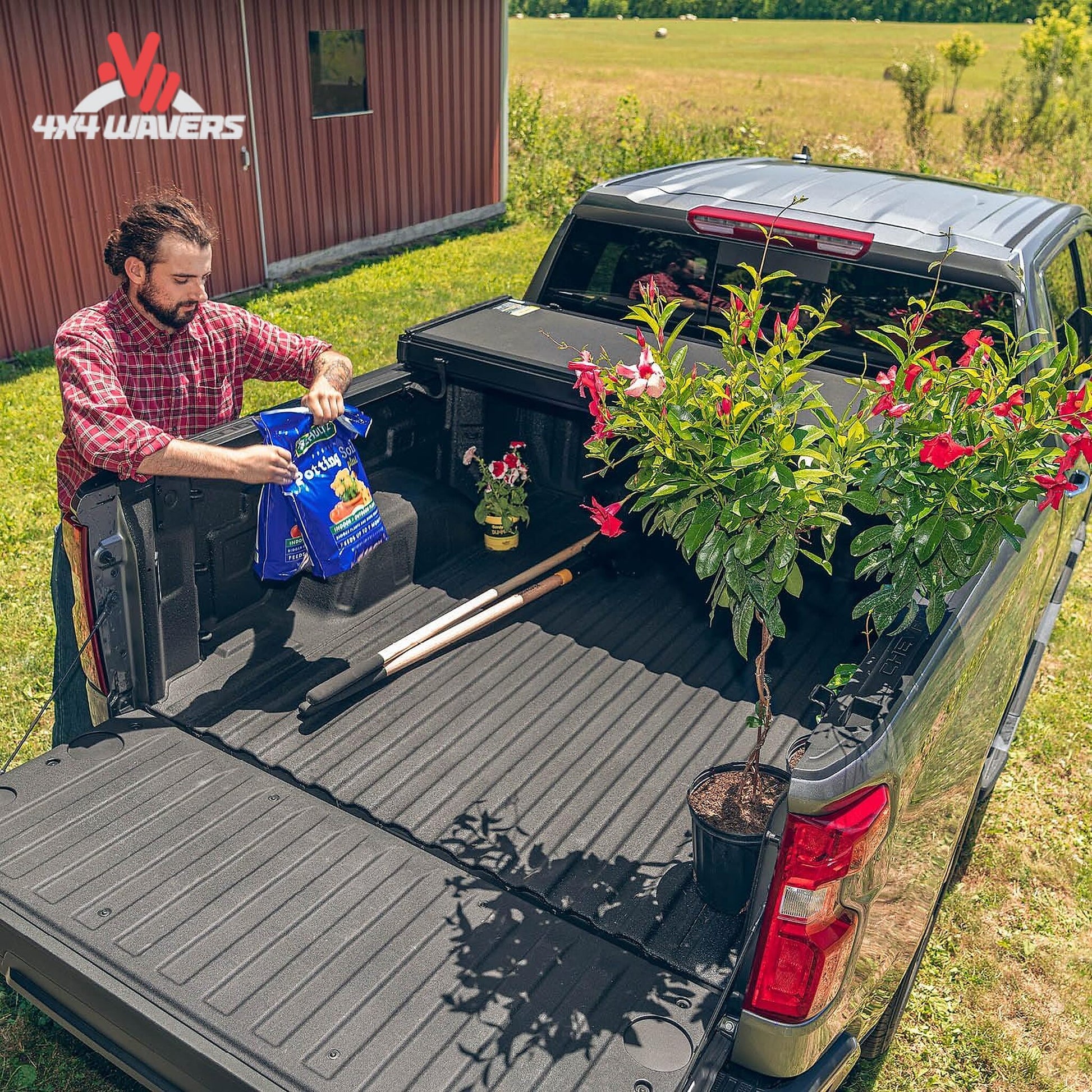 Extang Solid Fold ALX tonneau cover open on a 2015-2020 Ford F-150 with a 5.5ft bed, showcasing its foldable design.