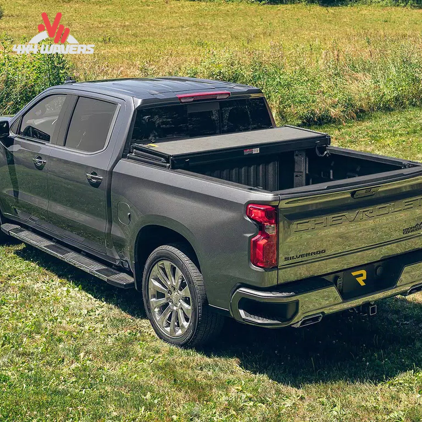 Extang Solid Fold ALX tonneau cover folded open on a 2015-2020 Ford F-150 with 5.5ft bed, showing its sleek, durable design.