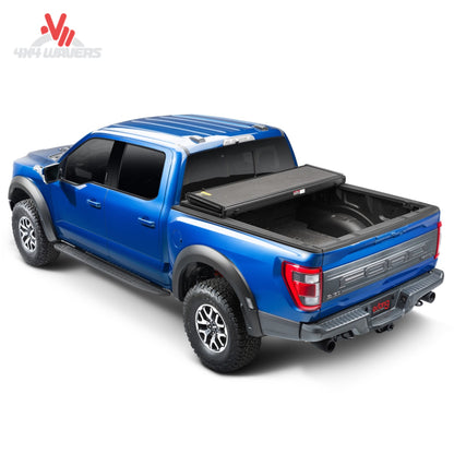 Extang Solid Fold ALX tonneau cover folded open on a 2015-2020 Ford F-150 with a 6.5ft bed, showing the durable, foldable design.