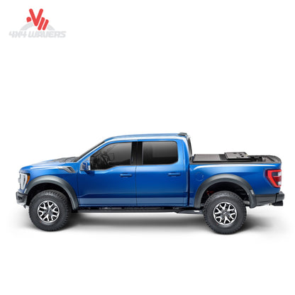 Extang Solid Fold ALX Tonneau Cover folded open on a 2015-2020 Ford F-150 with 6.5-foot bed, showing durable truck bed cover design.