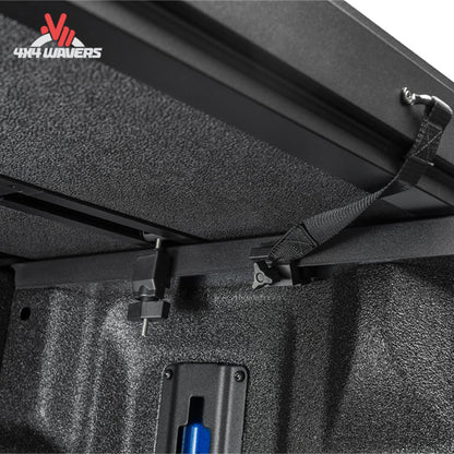 Close-up of Extang Solid Fold ALX Tonneau Cover's jaw grip clamp on a 2015-2020 Ford F-150 6.5ft bed, showcasing durable locking mechanism.
