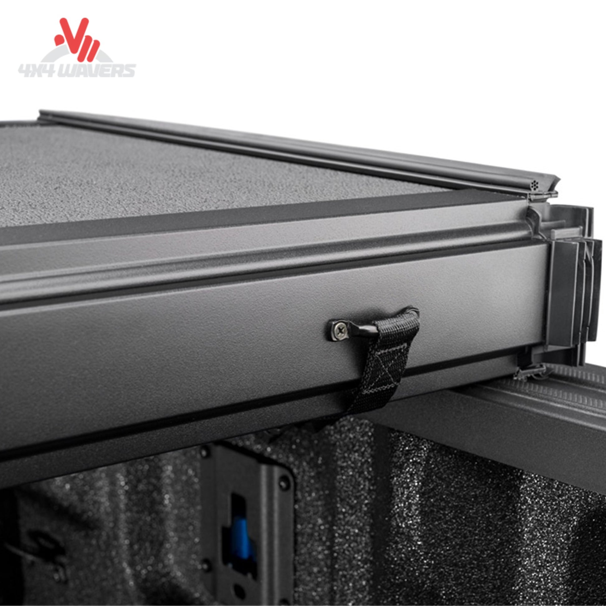 Extang Solid Fold ALX Tonneau Cover with rotary release latch on a 2015-2020 Ford F-150 6.5ft bed, showing latch detail.