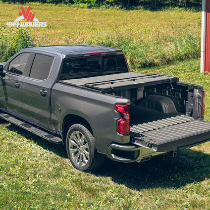 Extang Solid Fold ALX tonneau cover on a 2015-2020 Ford F-150 with 5.5ft bed, showing the sleek, folded design of the cover.