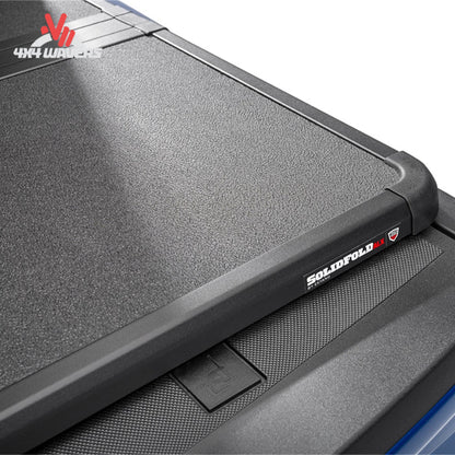 Extang Solid Fold ALX tonneau cover on a 2015-2020 Ford F-150 with 6.5ft bed, showing the sleek, foldable design on the truck bed.