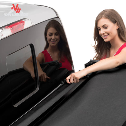 Close-up of Extang Trifecta 2.0 tonneau cover hinge and EZ Lock clamp on a 2009-2014 Ford F-150 with a 6.5ft bed.