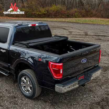 Extang Trifecta 2.0 tonneau cover on a 2009-2014 Ford F-150 with 5.5ft bed, shown folded open for bed access.