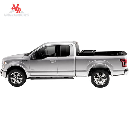 Extang Trifecta 2.0 tonneau cover folded open on 2009-2014 Ford F-150 with a 6.5ft bed, showing bed access and cover design