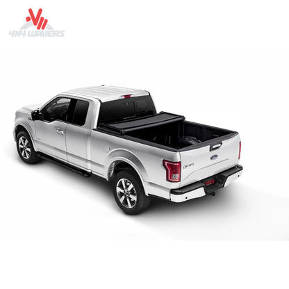 Extang Trifecta 2.0 tonneau cover folded open on a 2015-2020 Ford F-150 with 6.5ft bed, showing bed access and cover design.