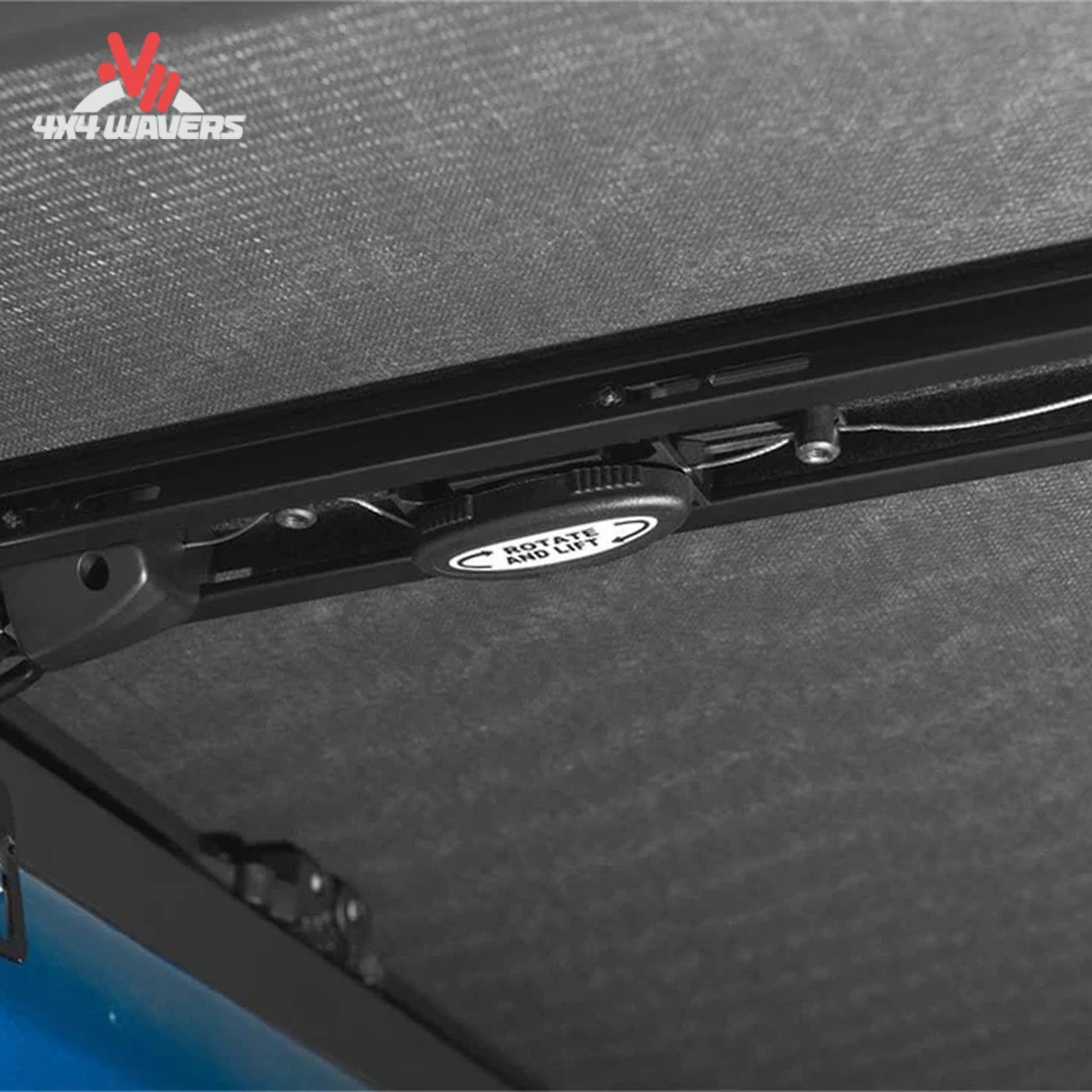 Close-up of Extang Trifecta ALX Tonneau Cover rotary release latch on 2015-2020 Ford F-150 with a 6.5ft bed.