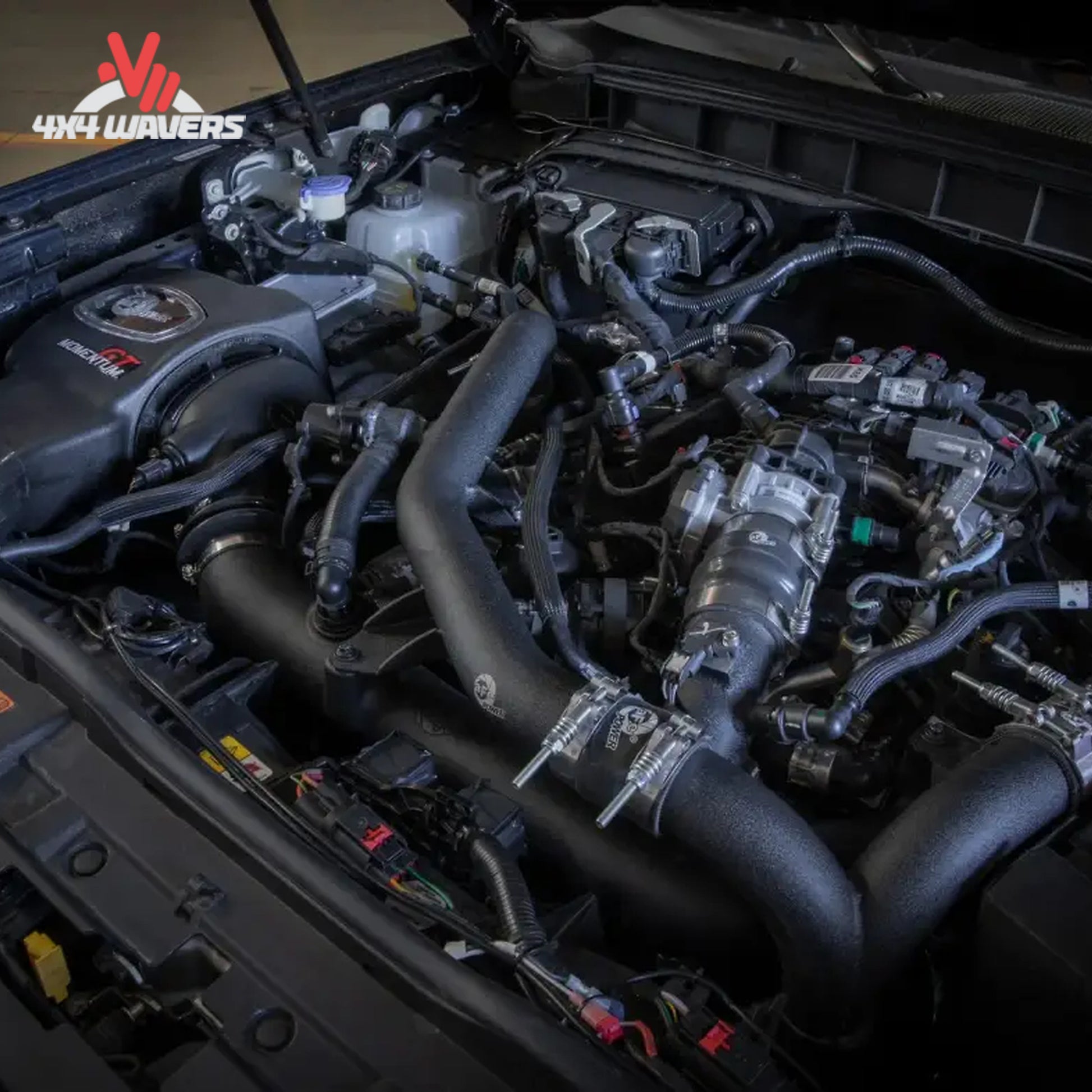 aFe Momentum GT intake installed on Ford Bronco 2.7L EcoBoost; Engine bay view showing installed aFe cold air intake system on Bronco 2.7L