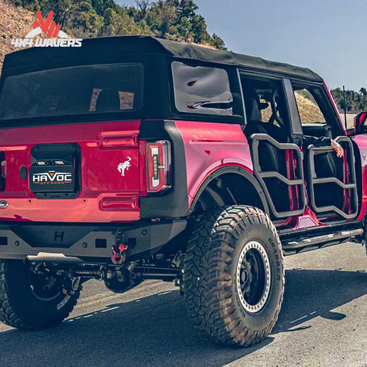 Modified Ford Bronco equipped with Havoc Steel Bender rear armor during an overland adventure
