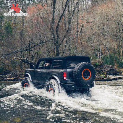 Modified Ford Bronco equipped with Havoc Steel Bender rear armor during an overland adventure