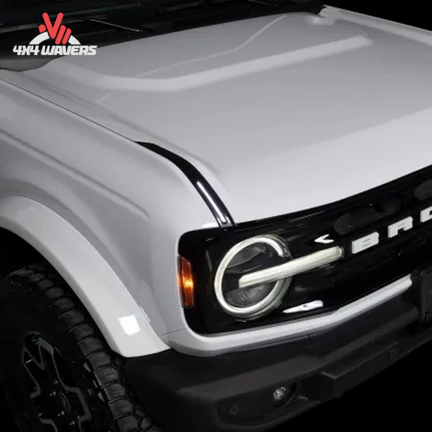 Front view of a Ford Bronco featuring illuminated Putco Luminix grille lights