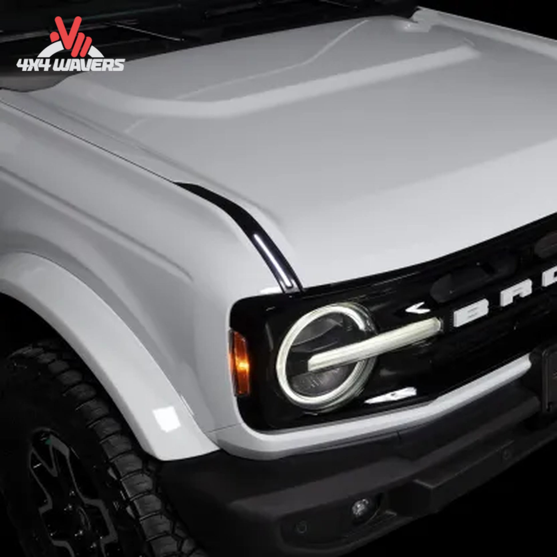 Front view of a Ford Bronco featuring illuminated Putco Luminix grille lights