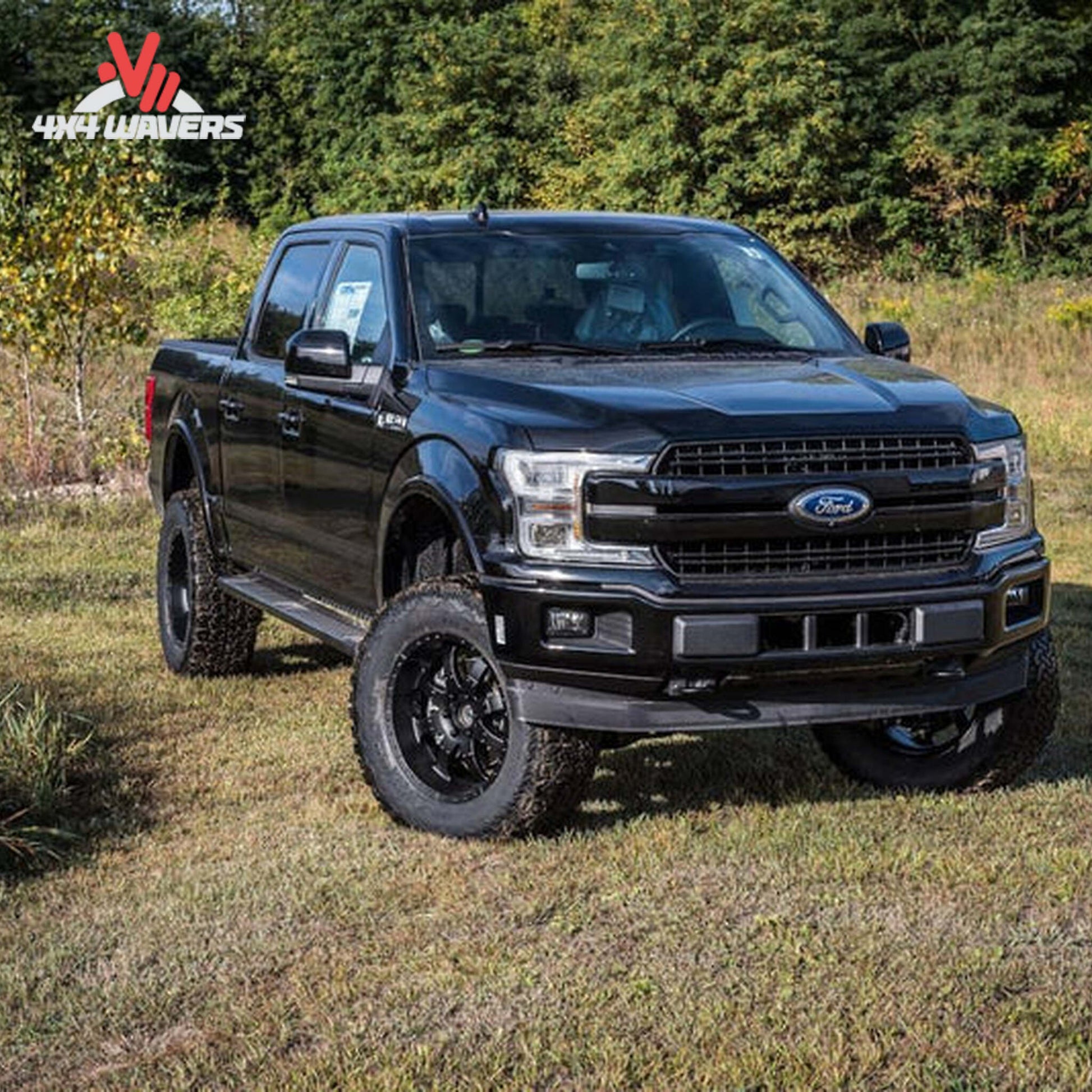 BDS 6-inch lift kit with NX2 shocks installed on a black Ford F-150 4WD truck with steel bumper