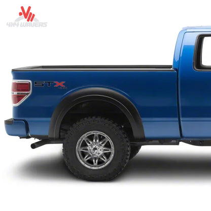 Husky Extend-A-Fender Flares installed on a 2009-2014 Ford F-150 truck, enhancing wheel well coverage and vehicle style.
