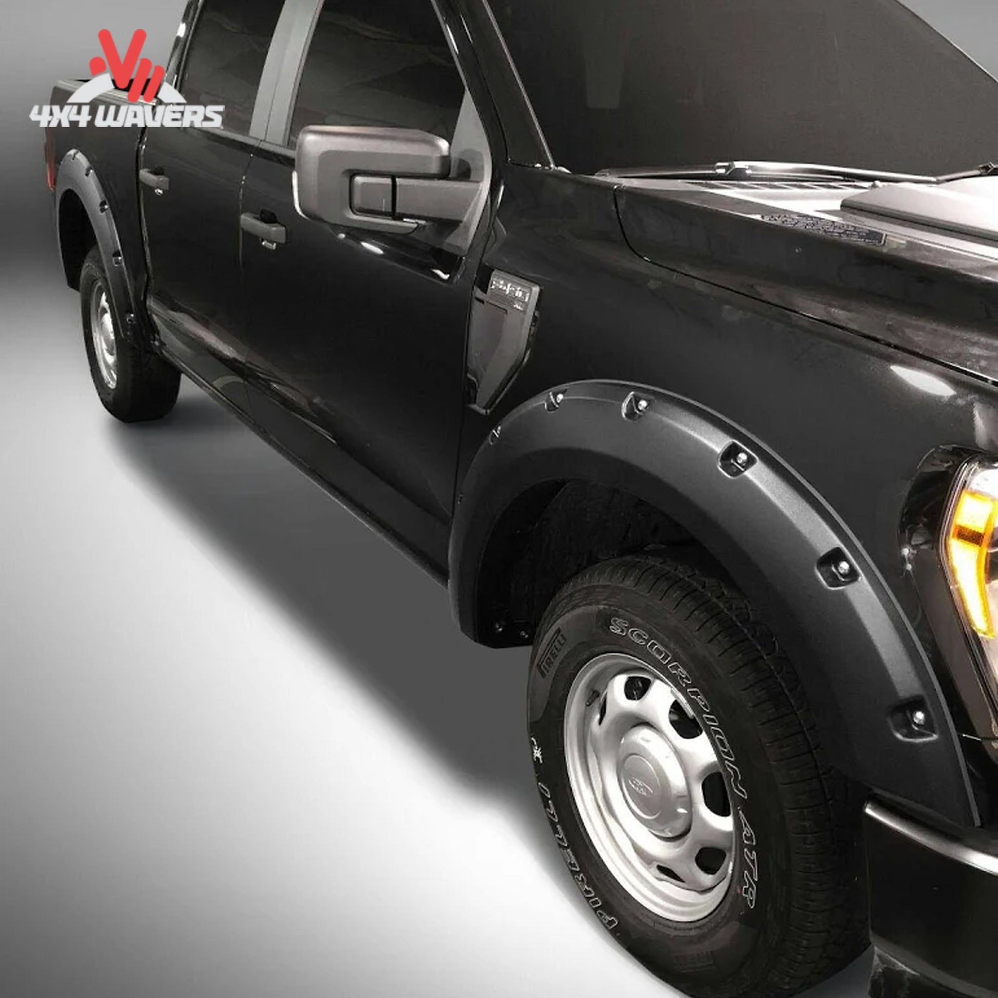 Husky Pocket Style Fender Flares installed on a 2021-2026 Ford F-150 pickup truck, showcasing durable wheel arch protection.