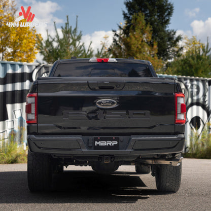 Ford F-150 with MBRP Armor Pro 3-Inch Cat-Back Exhaust featuring polished dual side tips installed on a truck.