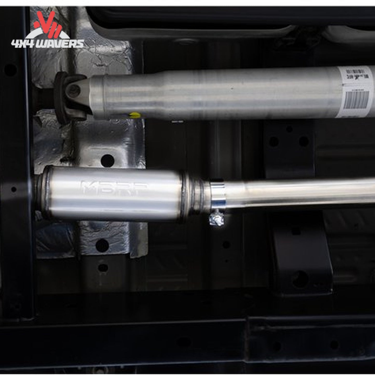 Ford F-150 with MBRP Armor Pro 3-inch cat-back exhaust system and polished dual side tips installed outdoors.
