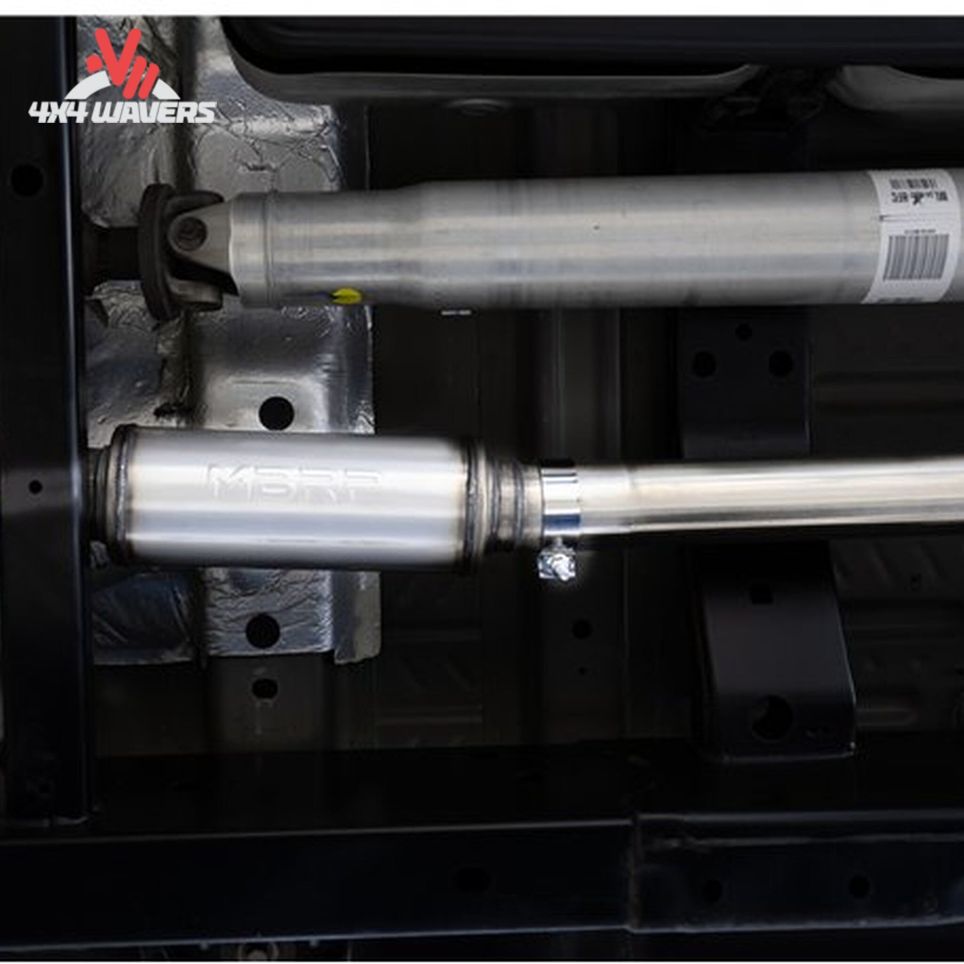 Ford F-150 with MBRP Armor Pro 3-inch cat-back exhaust system and polished dual side tips installed outdoors.