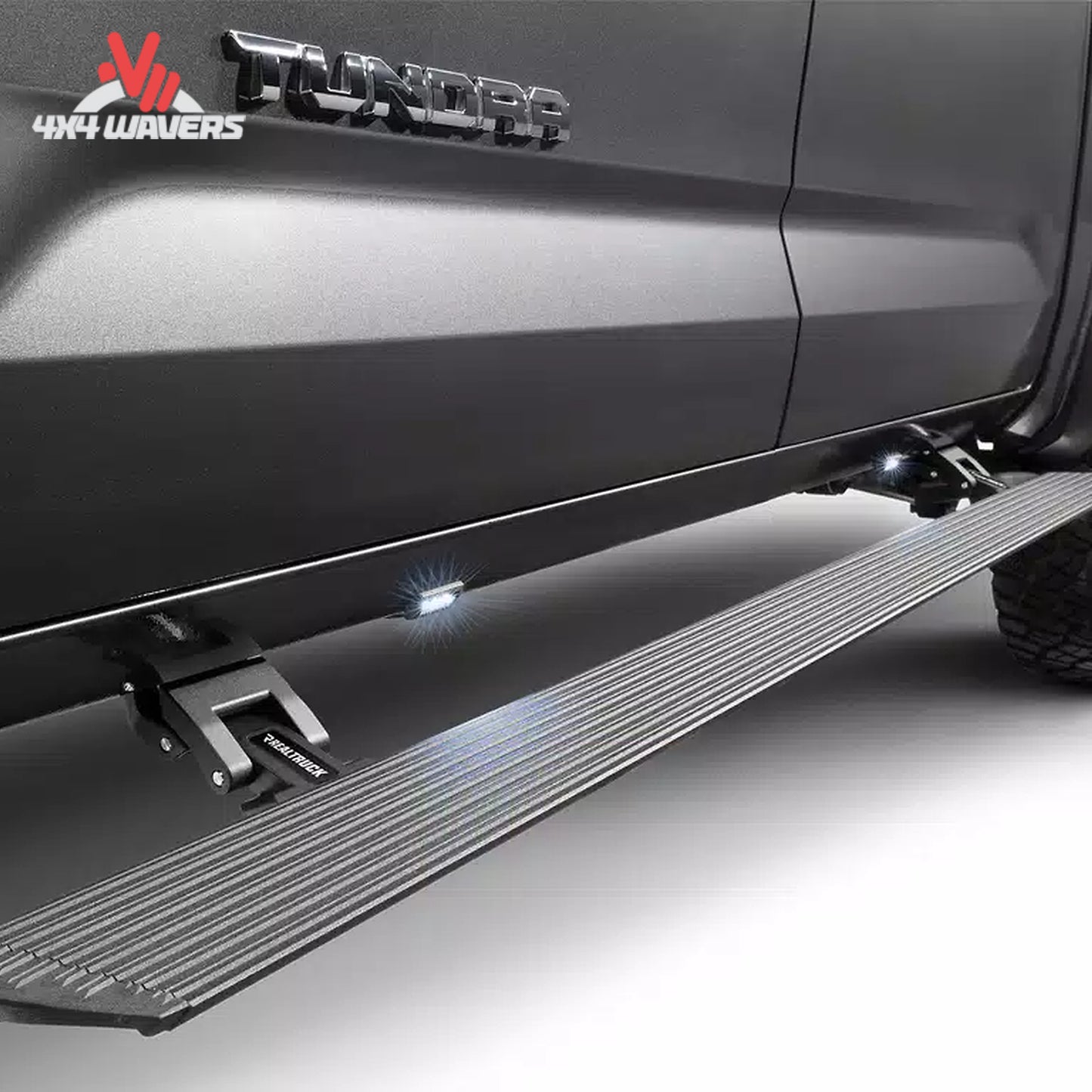 Go Rhino E1 electric power running boards on a Ford F-150 and Super Duty Crew Cab truck, showing sleek step design and branding