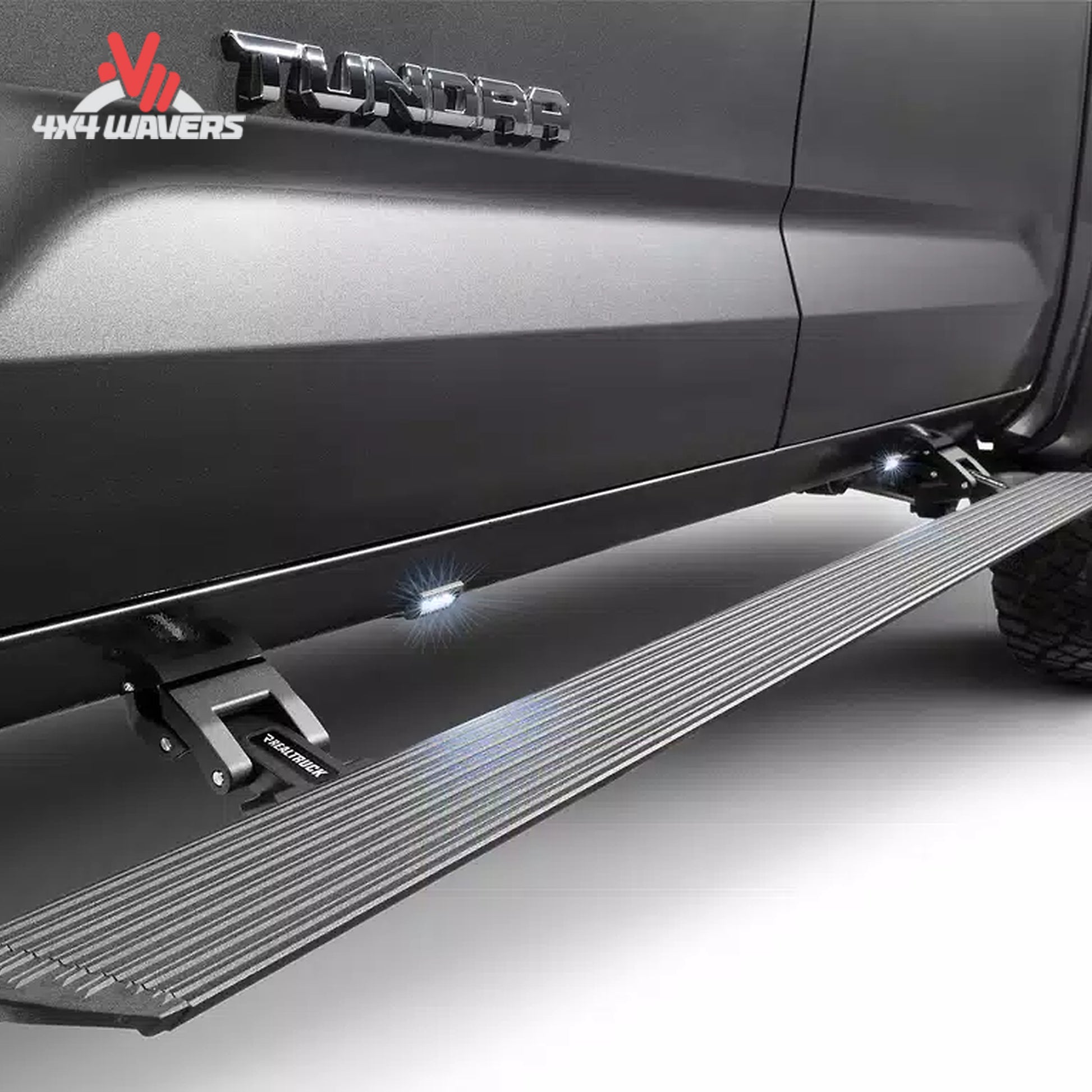 Go Rhino E1 electric power running boards on a Ford F-150 and Super Duty Crew Cab truck, showing sleek step design and branding
