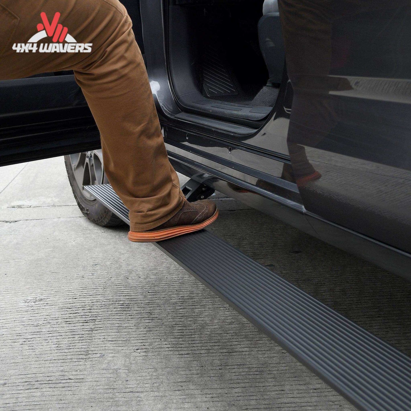 Go Rhino E1 electric power running boards installed on a 2015-2026 Ford F-150 and Super Duty Crew Cab pickup truck.