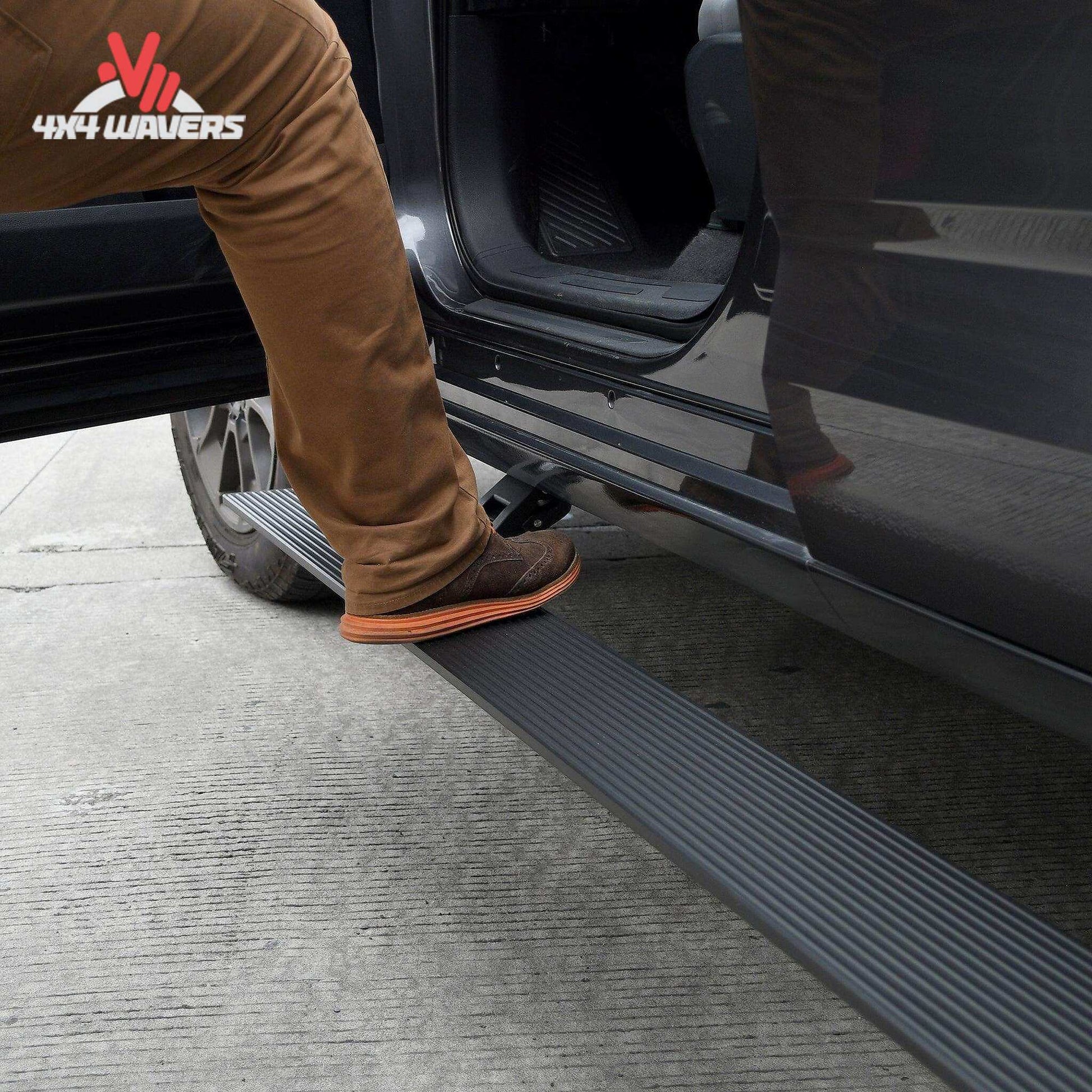 Go Rhino E1 electric power running boards installed on a 2015-2026 Ford F-150 and Super Duty Crew Cab pickup truck.