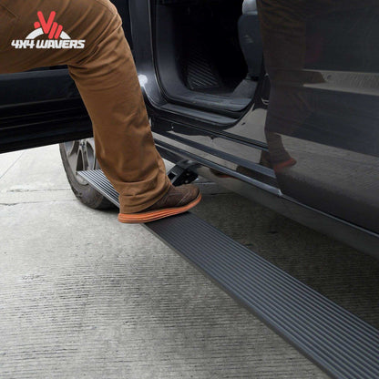 Go Rhino E1 electric power running boards installed on a 2015-2026 Ford F-150 and Super Duty Crew Cab pickup truck.