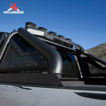 Go Rhino Sport Bar 2.0 bed-mounted roll bar with fixed light mount on a 2015-2026 Ford F-150 pickup truck.
