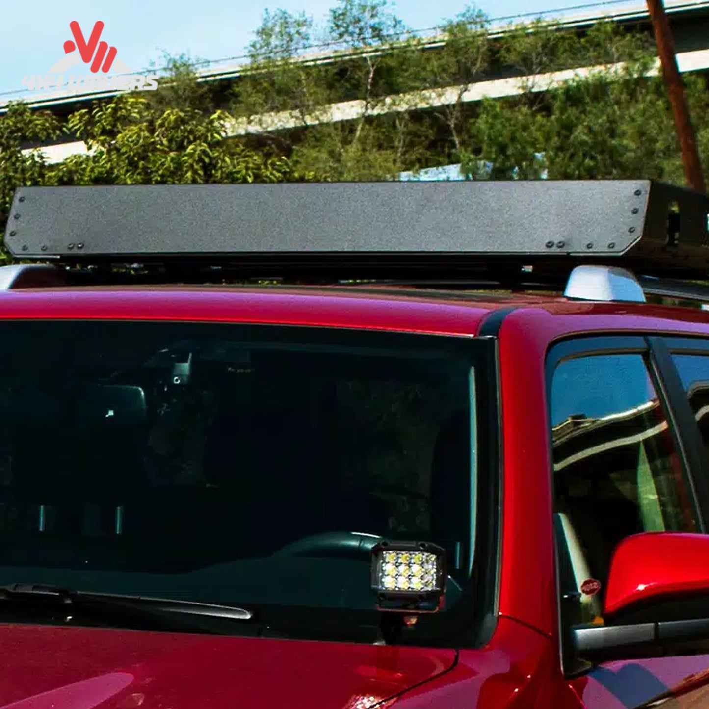 Universal Go Rhino cargo roof rack mounted on an SUV carrying camping and off-road equipment