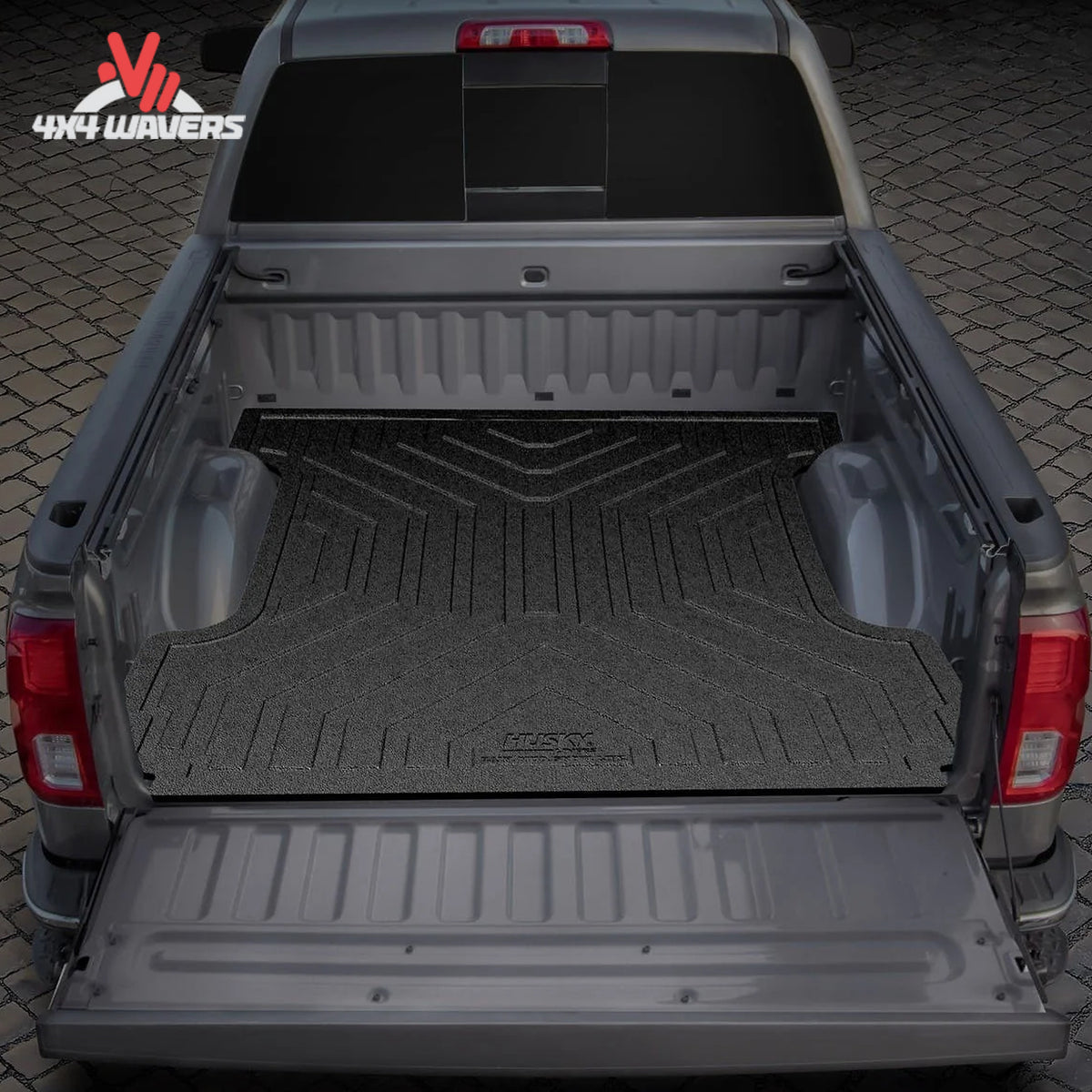 Husky Heavy Duty Bed Mat installed in 6.5ft Ford F-150 truck bed, durable liner for protection and heavy-duty use.