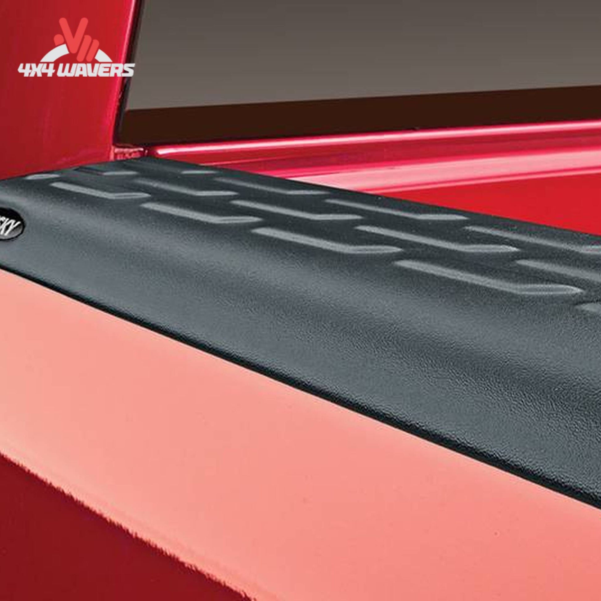 Side perspective of Chevy Silverado truck bed rail protected by Husky bed caps SKU 2888010