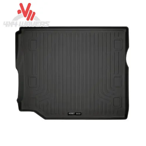 Husky WeatherBeater cargo liner for 2018-2025 Jeep Wrangler JL Unlimited, showing fitted floor mats with subwoofer cutout.