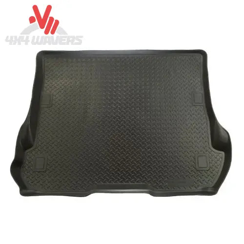 Husky WeatherBeater cargo liner for Jeep Wrangler JK Unlimited 2011-2018, durable floor mat protecting cargo area from dirt and spills.