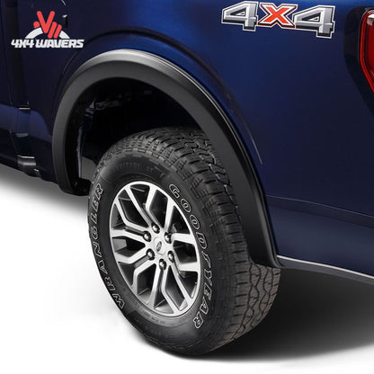 Husky OE style fender flare installed on front left of 2021-2026 Ford F-150, black plastic, rugged automotive accessory.