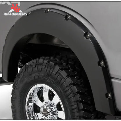 Husky Pocket Style Fender Flares with rivet detail on a 2009-2014 Ford F-150 truck for added protection and rugged look.