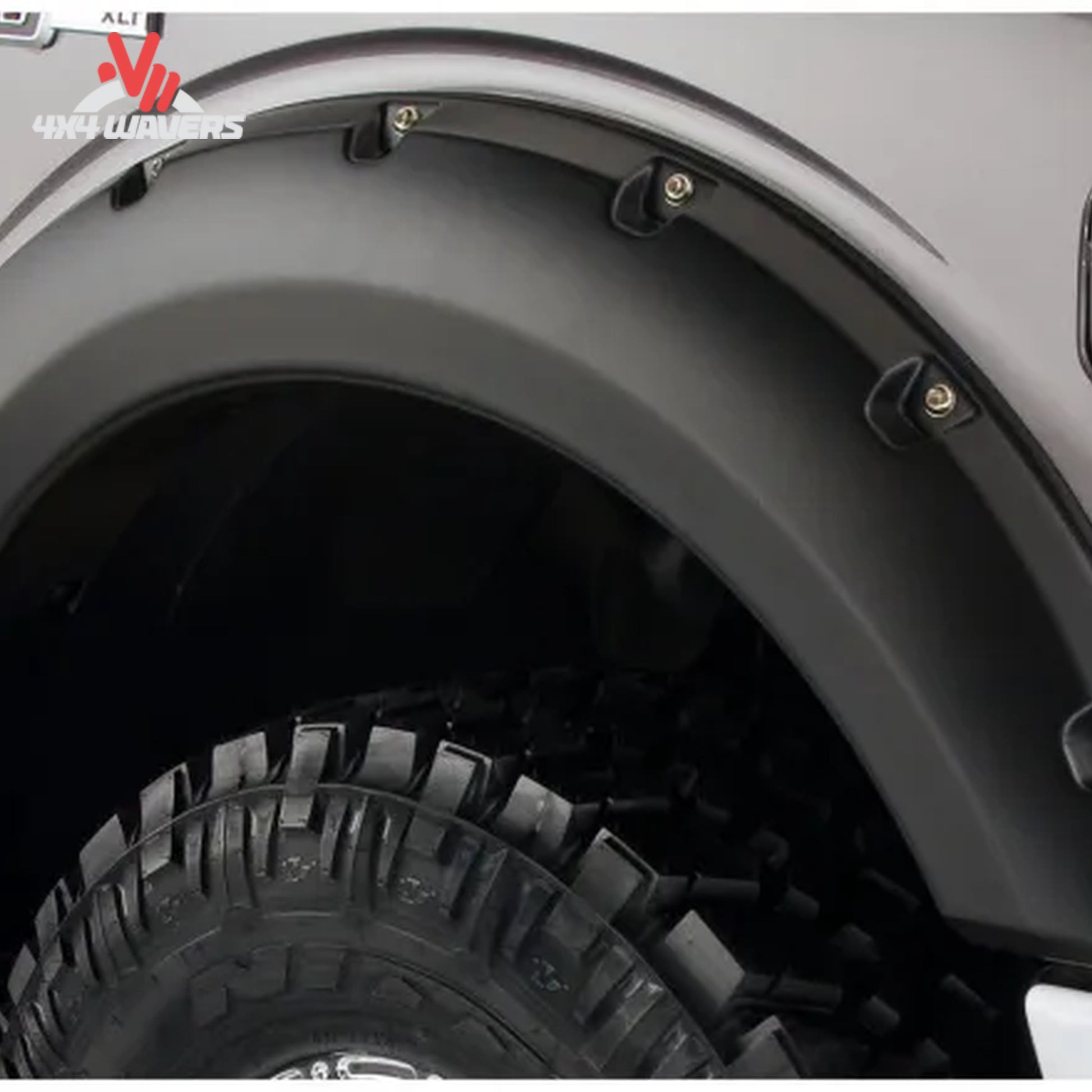 Husky Pocket Style Fender Flares with rivet detail on a 2009-2014 Ford F-150 truck for enhanced style and protection.