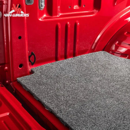 Husky Guardian Comfort Bed Mat with padded surface for 15-26 Ford F-150 6.5ft bed, designed as a durable bed liner.