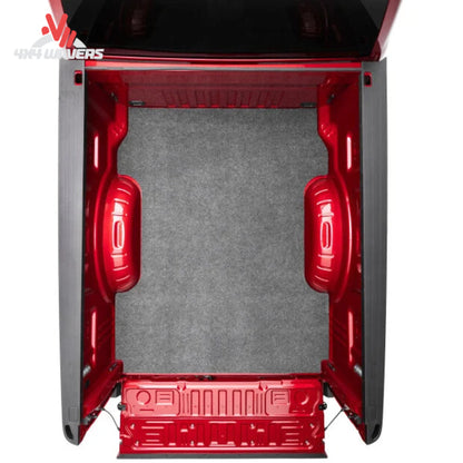Husky Guardian Comfort Bed Mat installed in a 15-26 Ford F-150 5.5ft bed, providing durable protection and comfort.