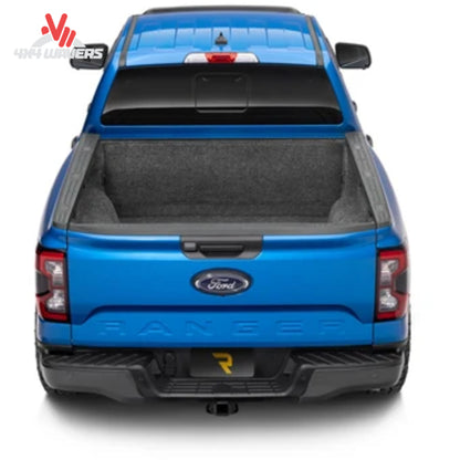 Husky Guardian Comfort Bedliner for 15-26 Ford F-150 6.5ft bed, durable black bed mat protecting truck bed interior.