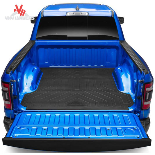 Heavy-duty rubber bed mat by Husky Liners for 2015-2026 Ford F-150 5.5 ft bed, showing a durable black liner in the truck bed.