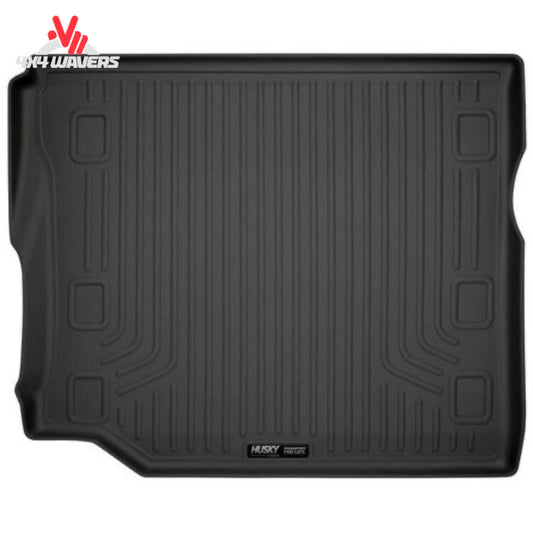Husky Liners WeatherBeater cargo liner for Jeep Wrangler JL 4-door, durable floor mat with subwoofer cutout, black rubber material.