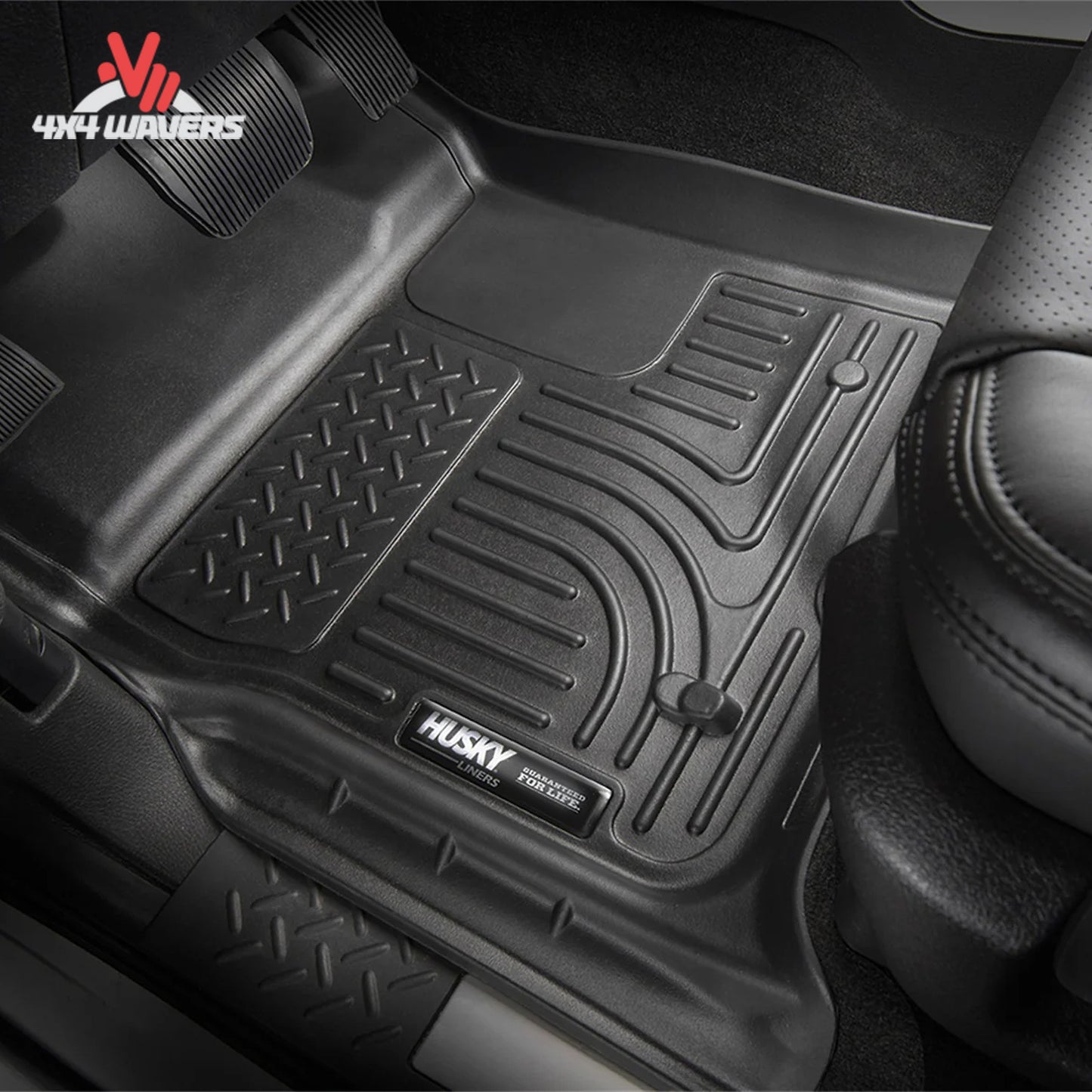 Custom-fit Husky WeatherBeater floor liner system for Jeep Gladiator JT featuring raised containment edges for mud, snow, water, and road salt protection