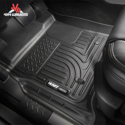 Custom-fit Husky WeatherBeater floor liner system for Jeep Gladiator JT featuring raised containment edges for mud, snow, water, and road salt protection