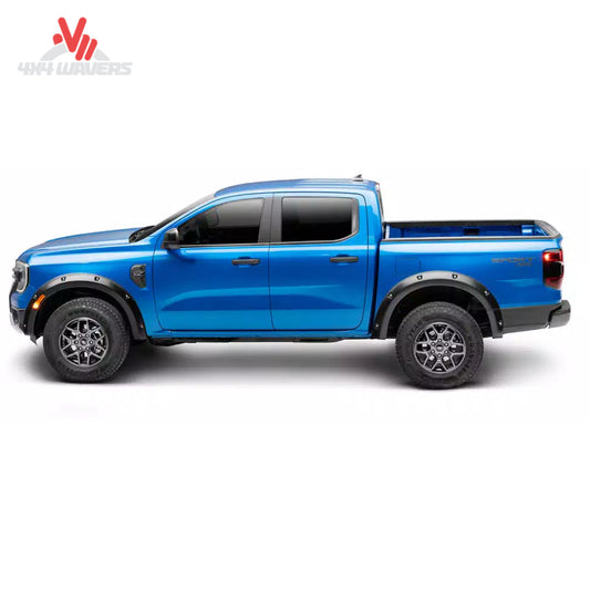 Off-road GMC Sierra 1500 fitted with Husky Liners 2804909 Pocket style black fender flares