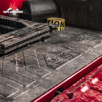 Husky Heavy Duty Bed Mat for 15-26 Ford F-150 6.5ft bed, durable rubber liner fitting truck bed interior.